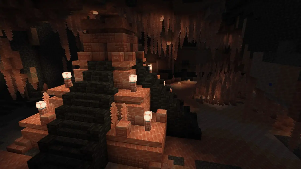 A pink salt cave lit by lamps