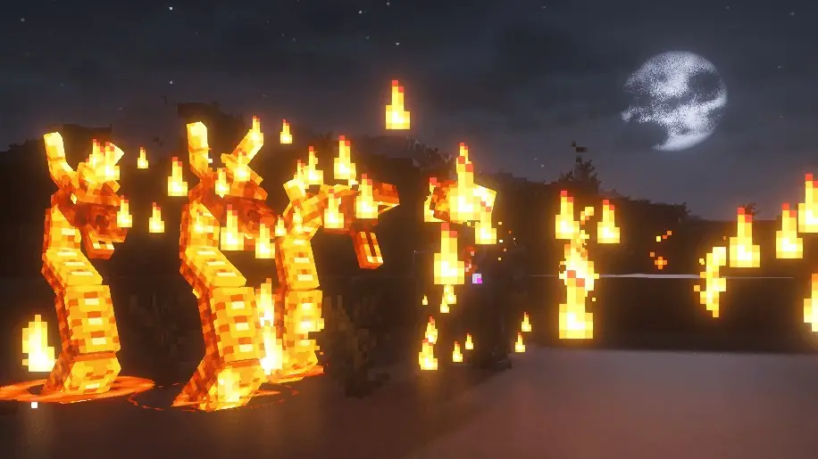 Pillars of fire at night under a full moon